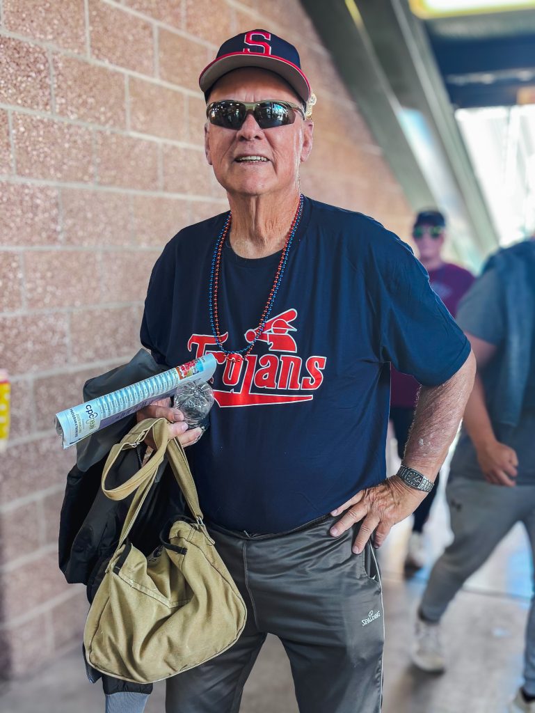 In this photo, Seminole resident and Trojan fan Bill Davis poses for photo after he checks an item off his bucket list by following the Trojans to Grand Junction, Colorado, for the JUCO World Series.