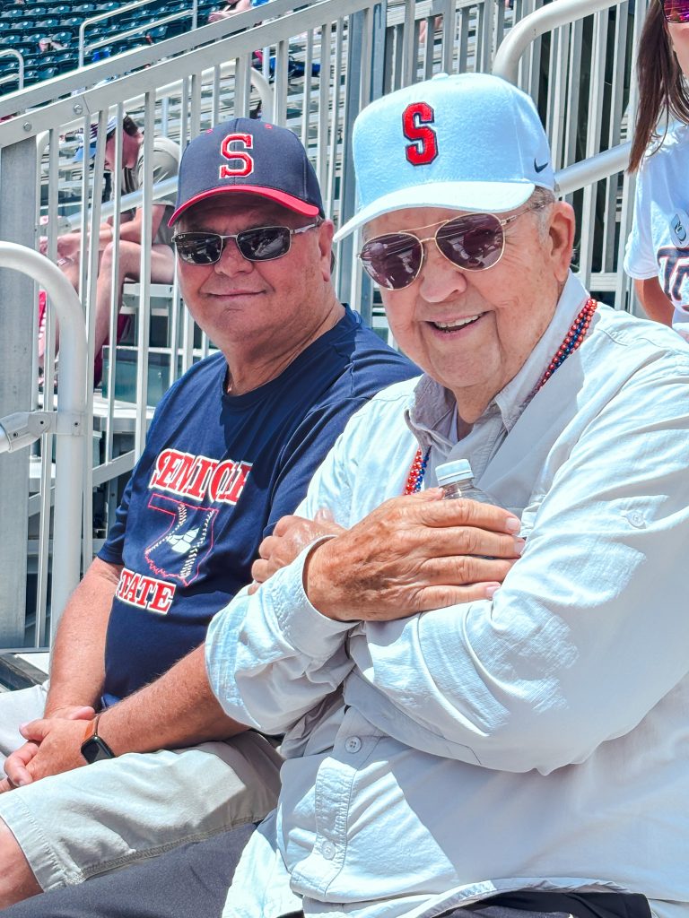 In this photo, SSC Regent and former Trojan Curtis Morgan, left, and SSC Educational Foundation Trustee and longtime Trojan fan Jim Hardin, right, enjoy baseball action at the JUCO World Series.