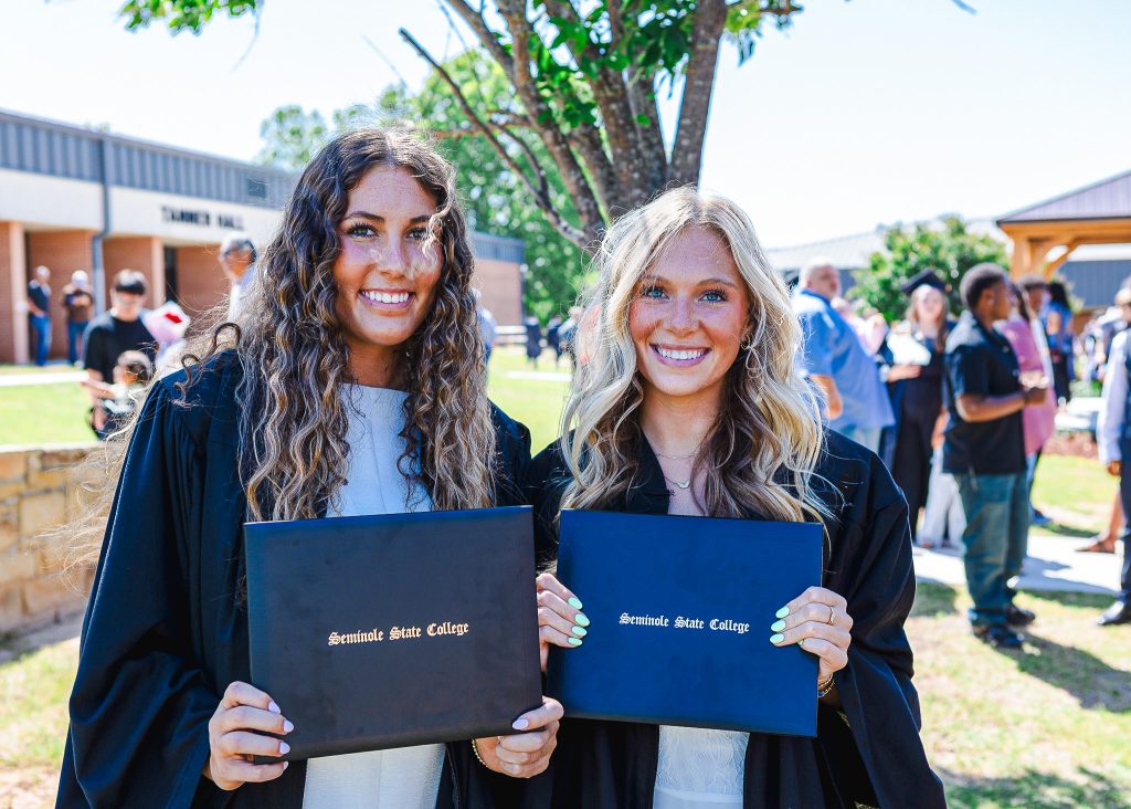 In this photo, SSC graduates Caeli Schaefer of Stillwater and Breana Stumbo of Lubbock, Texas, pose for a photo following the ceremony.