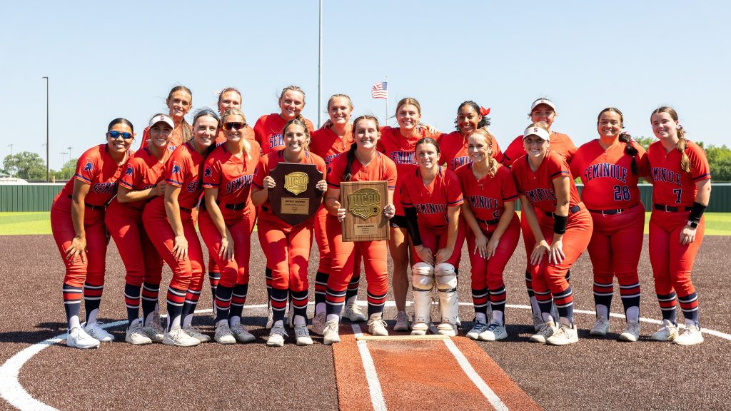 The SSC softball team poses for a photo with the NJCAA DI South Central District Trophy.