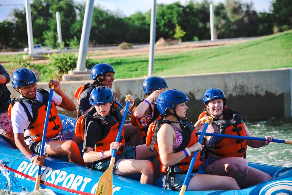 In this photo, Seminole State College Upward Bound students are shown paddling a raft at Riversport OKC.
