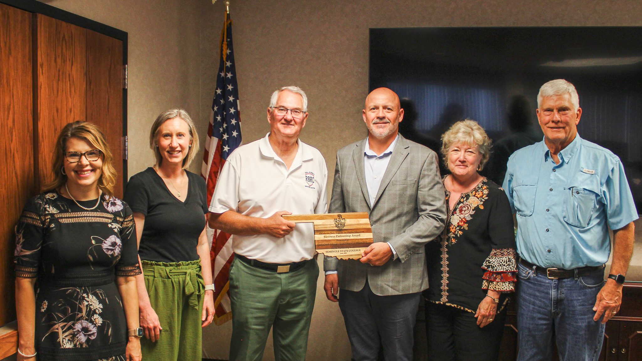 In this photo, posing as a group and pictured, from left, are Carla Tollett, CVEC Director of Communications and Member Engagement; Kim Pringle, SSC Director of Community Relations; Danny Morgan, SSC Rural Business and Resources Center Director; Josh Hold, CVEC CEO; SSC President Lana Reynolds; and Joe Semtner, CVEC Board President and District 6 Trustee.