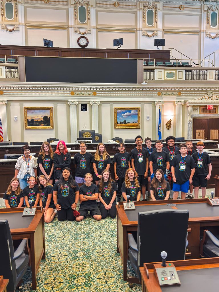 SSC GEAR UP students pose for a photo on the floor of the Oklahoma House of Representatives during a tour of the Oklahoma State Capitol.
