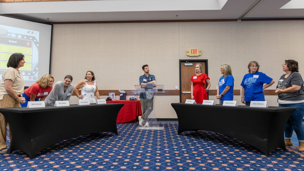 In this photo, SSC employees compete in a game of Family Feud during lunch on the first day of Fall In-Service. Pictured from left are Leslie Havileck, Kate Sprague, Skye Lattimore, Dr. Mindy Choate, Matt Kappele, Kim Pringle, Julie Mathews, Gerry Hatfield and Jamie Worthley.