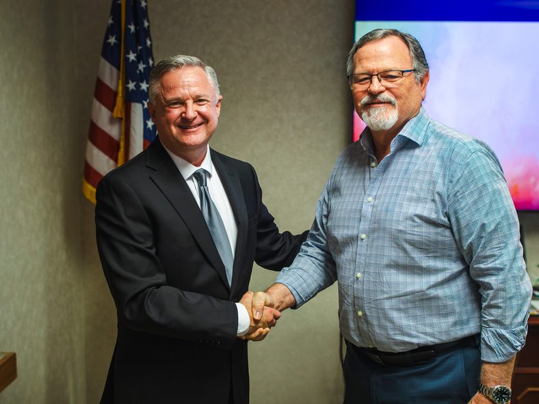 In this photo, Seminole City Attorney and Oklahoma Army National Guard Brigadier General Brad Carter (left) congratulates new Seminole State College Regent David Hooten (right) following the administration of the oath of office during the SSC Board of Regents meeting on Aug. 20. Hooten’s seven-year term began July 1, 2026, and concludes July 1, 2033.