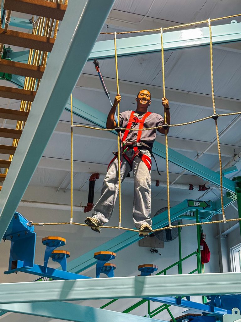 In this photo, SSC PLC student Keyan Brown of Conway, Arkansas, navigates the climbing maze at the Jasmine Moran Children’s Museum following the welcome reception.