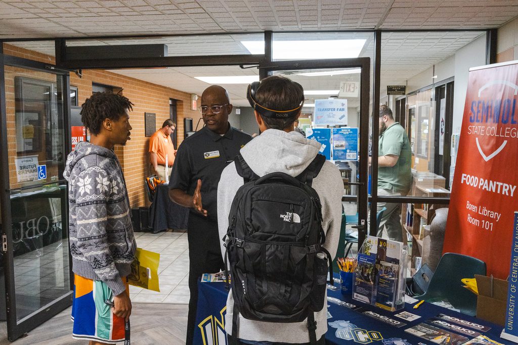 In this photo, Seminole State College students talk to a representative from the University of Central Oklahoma during a career fair hosted at SSC.