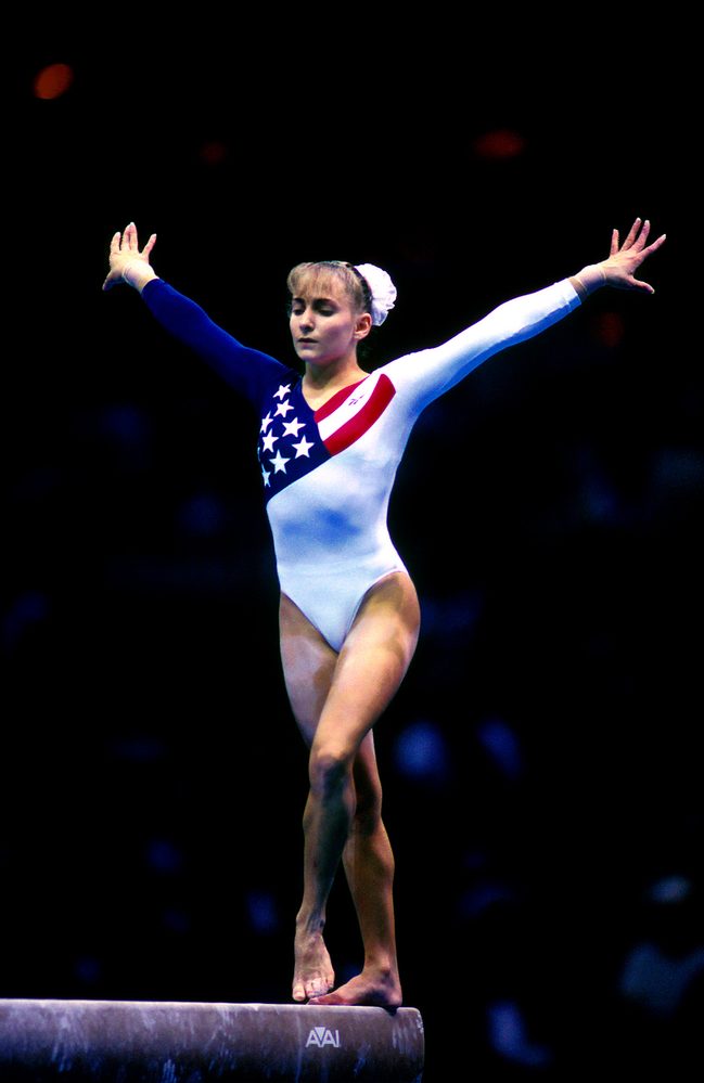 In this photo, Shannon Miller performs her gold medal-winning balance beam routine during the 1996 Olympic Games in Atlanta. Photo by Dave Black.