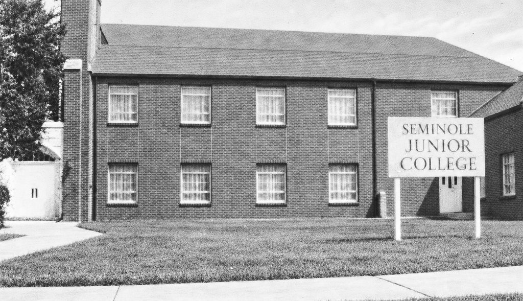 A Seminole Junior College sign stands outside First Presbyterian Church, which housed the college during the 1969–70 and 1970–71 academic years. The congregation provided the space rent-free and paid the utilities while the college developed its permanent campus.